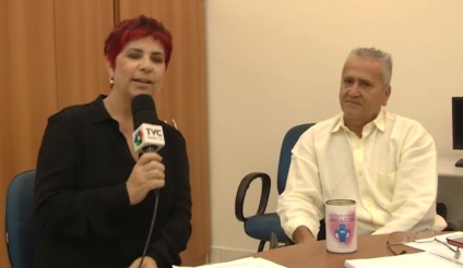A jornalista Maria do Carmo entrevista Josué de Souza, sobre a campanha dos cofres - Reprodução/TVC