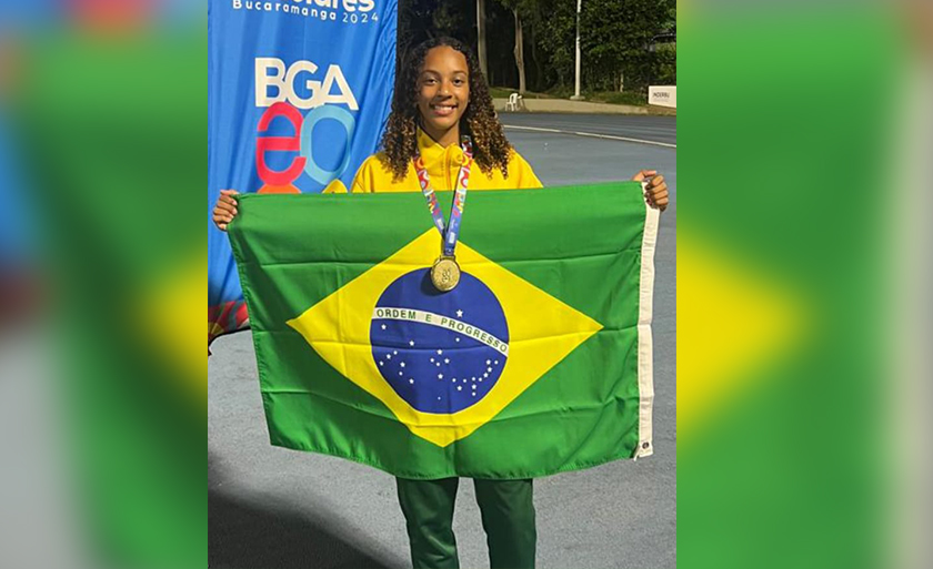 Atleta de Três Lagoas com sua medalha de ouro