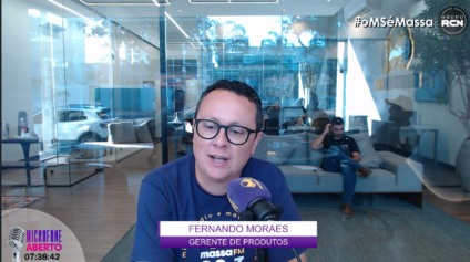O gerente de Produtos do Grupo RCN 67, Fernando Moraes, explica o que é a Invasão Massa, que chegou a Dourados movimentando o centro da cidade. (Foto: Reprodução)