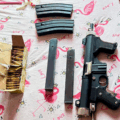 Arma e munições foram encontradas dentro de imóvel com fachada de salão no bairro Aero Rancho
