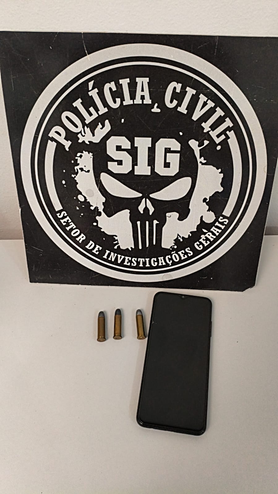 Celular foi furtado em agosto na cidade de Dourados, e as três munições seriam oriundas da venda de um "nóia" ao suposto traficante. Foto: Divulgação/Polícia Civil.