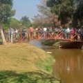 Fila para troca de quase 3 mil  mudas de arvores por gêneros alimentícios. (RC)