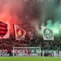 Torcedores de Flamengo e Palmeiras assistem à final da Libertadores em bar lotado em Campo Grande, em clima de decisão