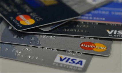 Percentual de famílias com dívidas cresce, mas inadimplência cai